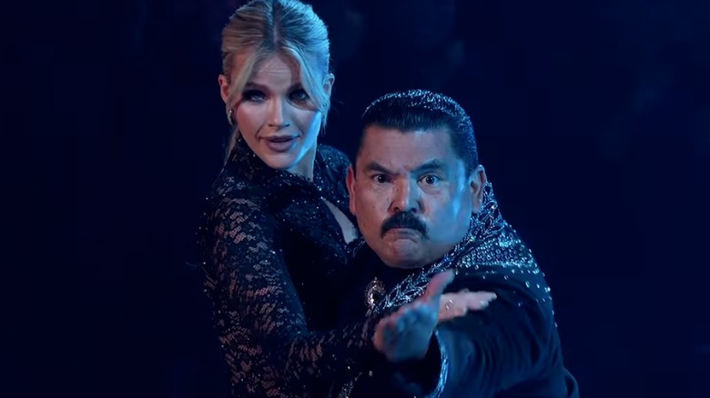 Witney Carson and Guillermo Rodriguez, both wearing sparkling outfits, dancing on "Dancing with the Stars"