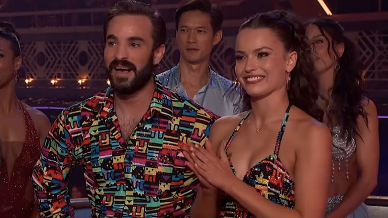 Conner Leavitt and Adele Zaikman in brightly colored outfits after performing on "Dancing with the Stars"