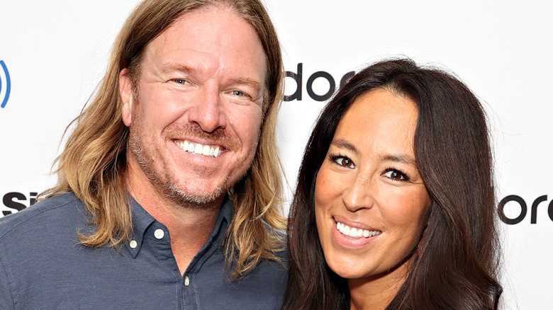 Chip and Joanna Gaines smiling at event