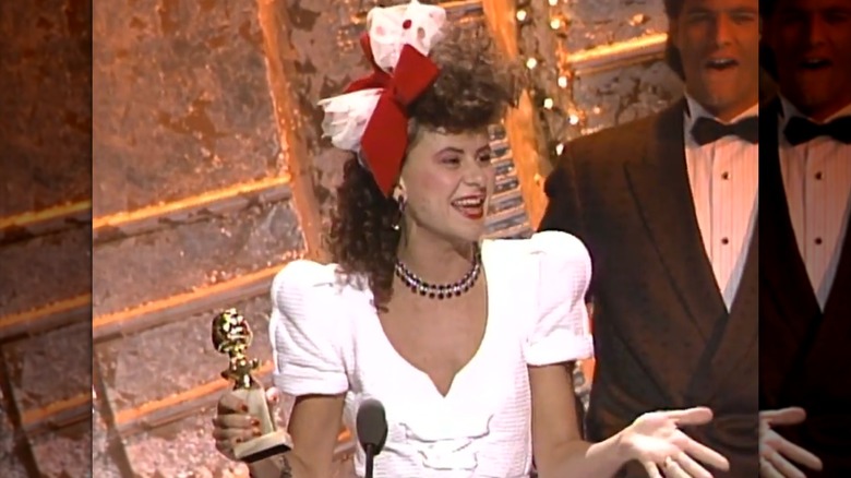 Tracey Ullman speaking into microphone