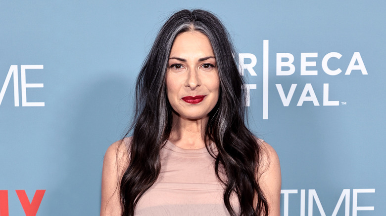 Stacy London looking into camera