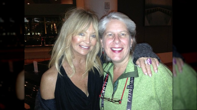 Goldie Hawn with her arm around Dr. Jill Taylor