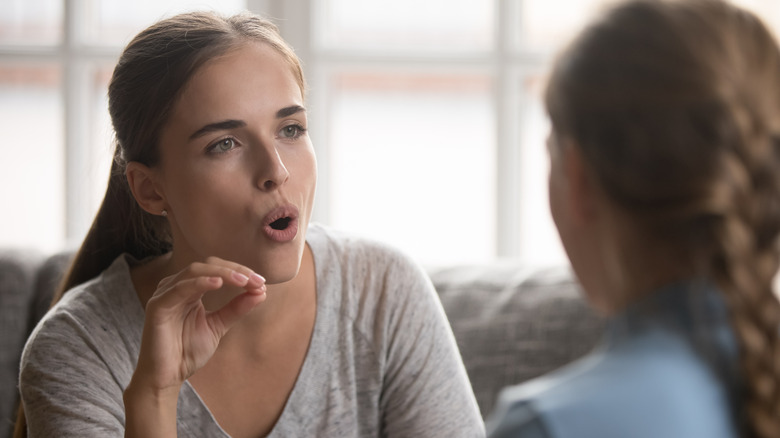 Woman speaking to therapist