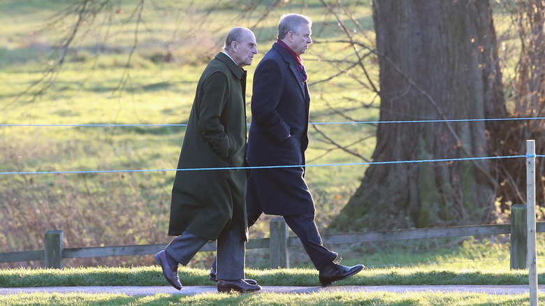 Prince Philip and Prince Andrew on a walk at Sandringham