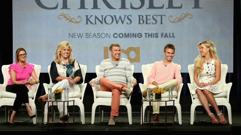 The Chrisley family smiling onstage