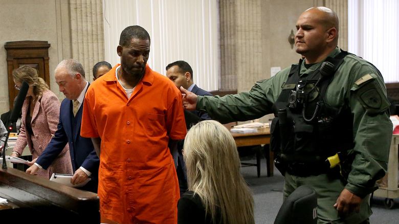 R. Kelly in orange jumpsuit during a court appearance