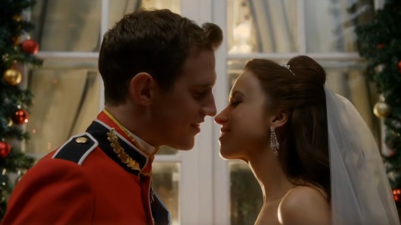 Screen grab of Stephen Hagan and Lacey Chabert about to kiss in "A Royal Christmas"