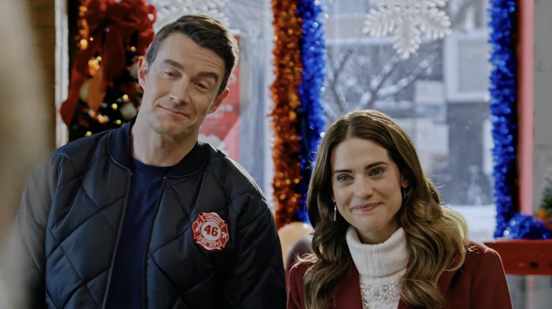 Robert Buckley and Lindsey Fonesca acting in Holiday Touchdown.