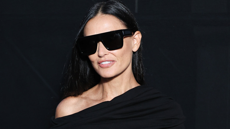Demi Moore posing in sunglasses