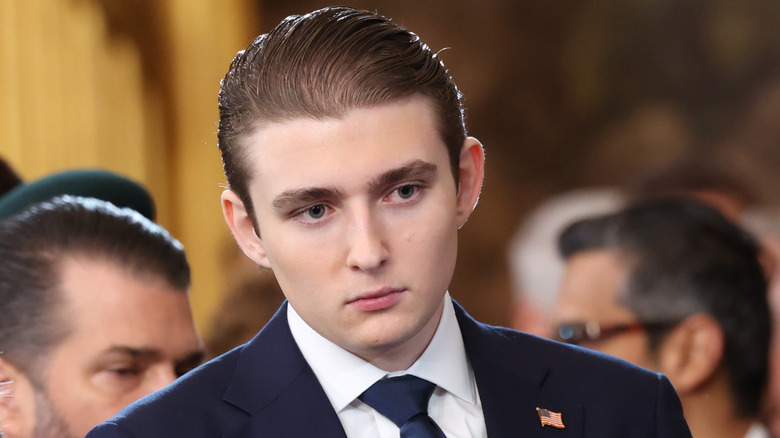 Barron Trump looks on as U.S. Democratic Leader Chuck Schumer waves to a guest during inauguration ceremonies in the U.S. Capitol Rotunda on January 20, 2025 in Washington, DC (2025)