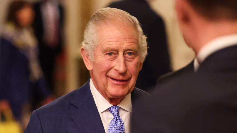 King Charles III smiling