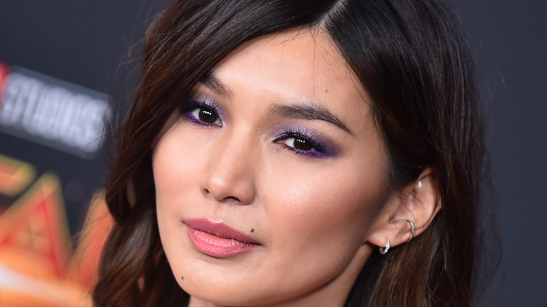 Gemma Chan poses on the red carpet