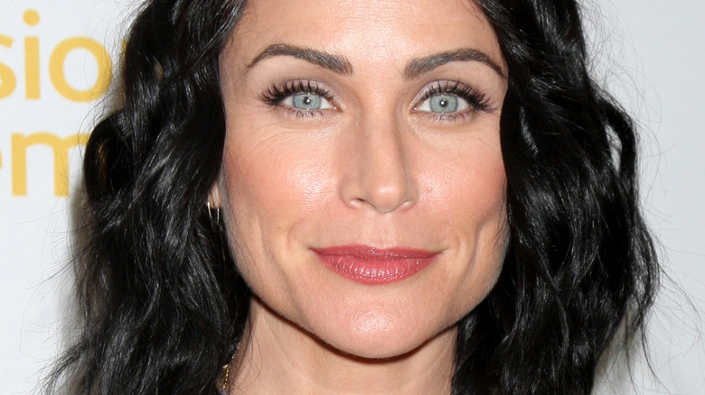 Rena Sofer posing