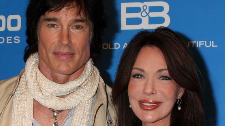 Ronn Moss and Hunter Tylo posing