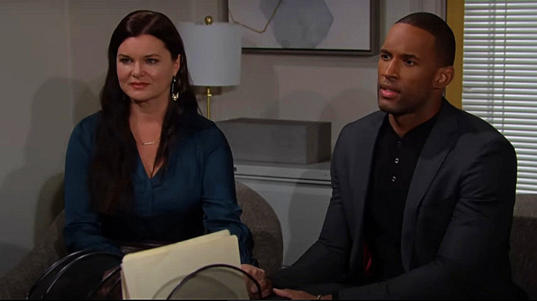 Carter and Katie looking concerned on The Bold and the Beautiful