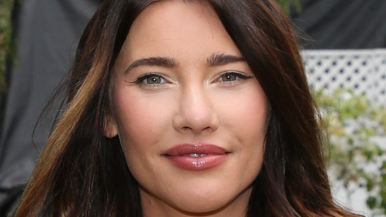 Jacqueline MacInnes Wood smiling softly