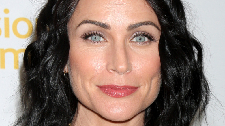 Rena Sofer posing