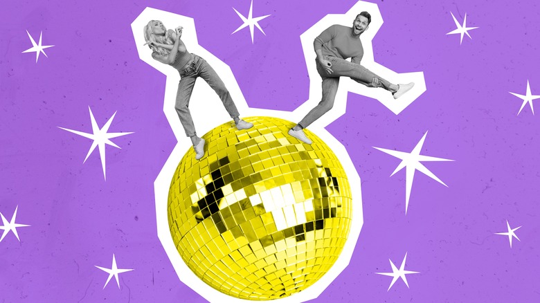People dancing on a disco ball