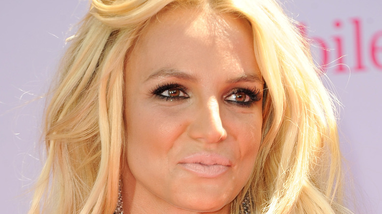 Britney Spears in black beaded top