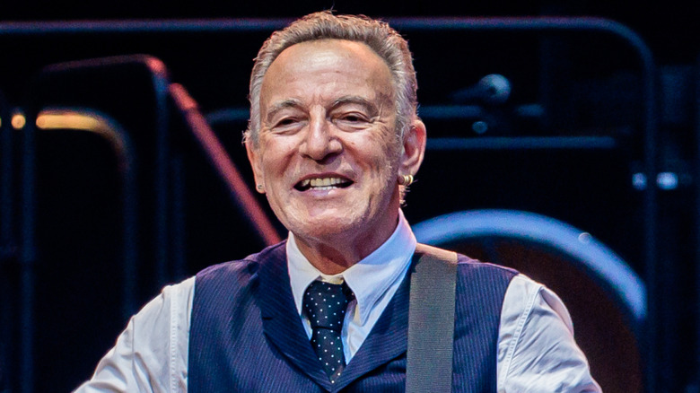 Bruce Springsteen smiling at a 2025 concert