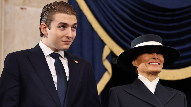 Barron and Melania Trump smiling at the 2025 inauguration