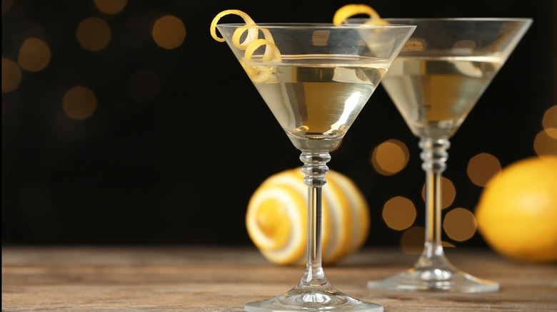 Martini cocktails with lemon peel