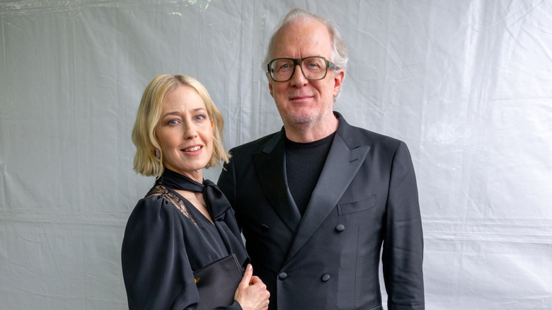 Carrie Coon posing with her husband Tracy Letts