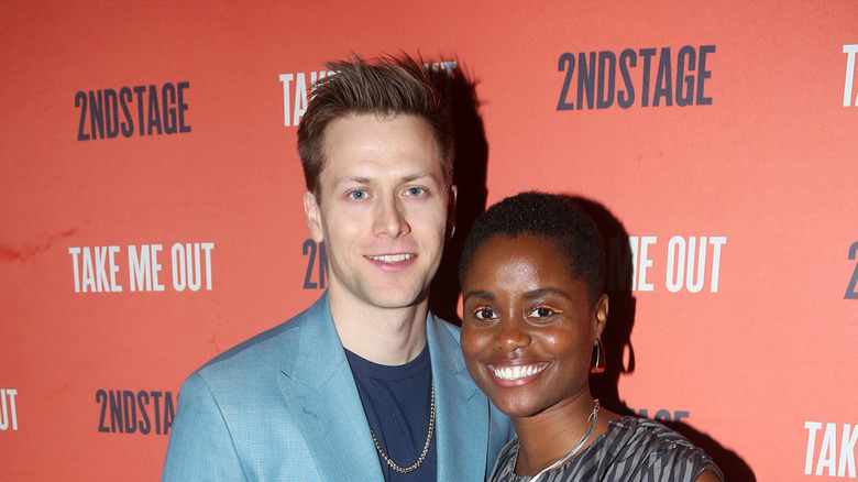Denée Benton and Carl Lundstedt posing opening party of Take Me Out