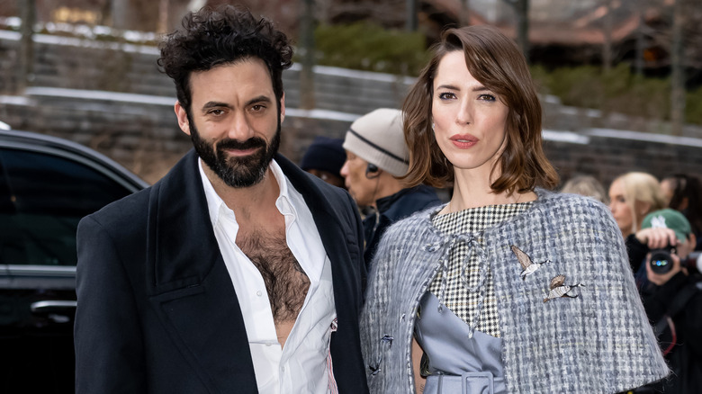 Morgan Spector and Rebecca Hall arriving at a fashion show