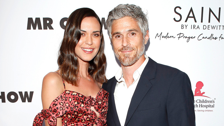 Dave, Odette Annable posing together