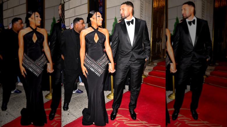 Megan Thee Stallion and Klay Thompson holding hands