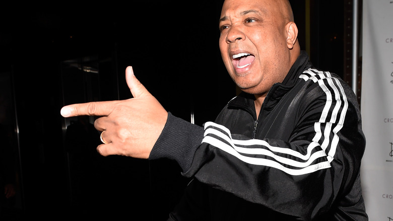 Rev. Run wearing Adidas tracksuit