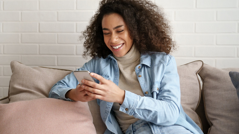 woman engaging in conversation on dating app