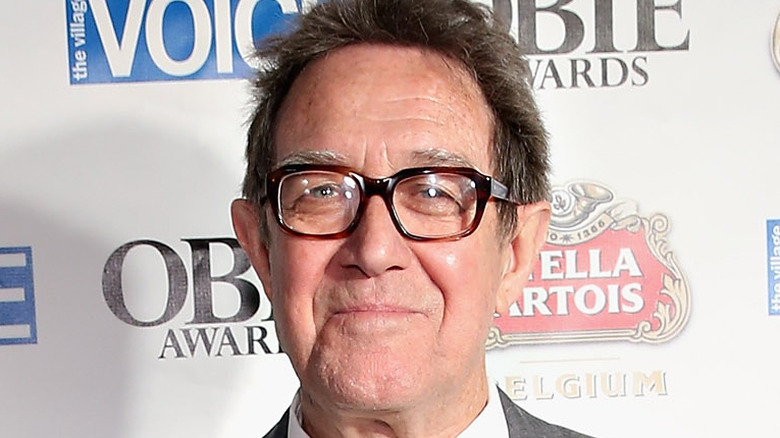 Larry Pine smiles proudly