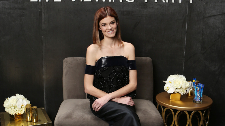 Rachel Melvin posing in a black dress