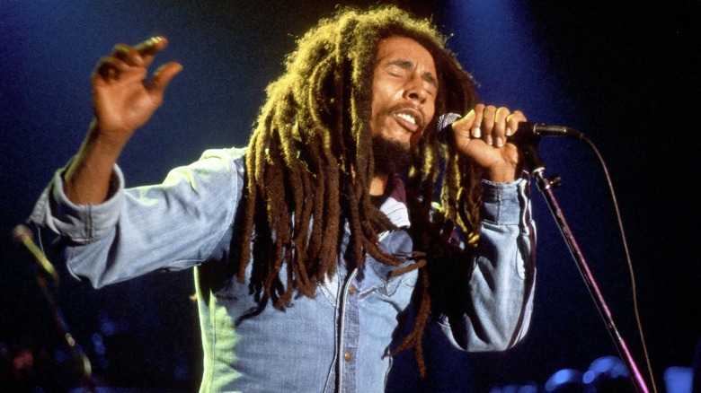 Bob Marley singing into microphone