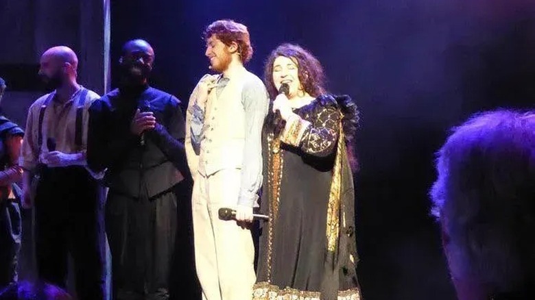 Kate Bush and son Albert "Bertie" McIntosh singing together on stage in 2014