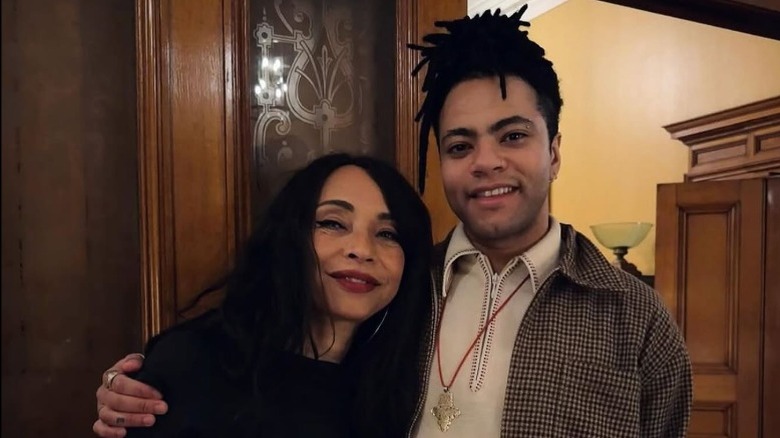 Izaak Theo Adu-Watts and Sade Adu smiling at the camera