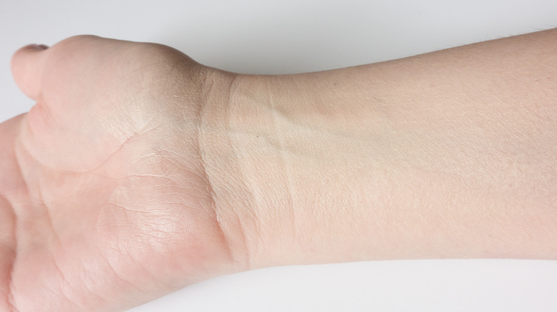 White person's wrist showing veins