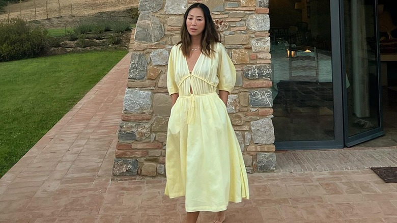 Aimee Song wearing butter yellow dress 