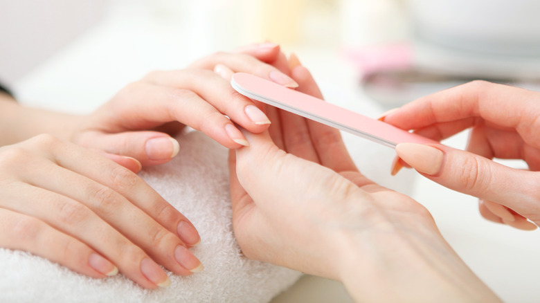 Woman getting a manicure