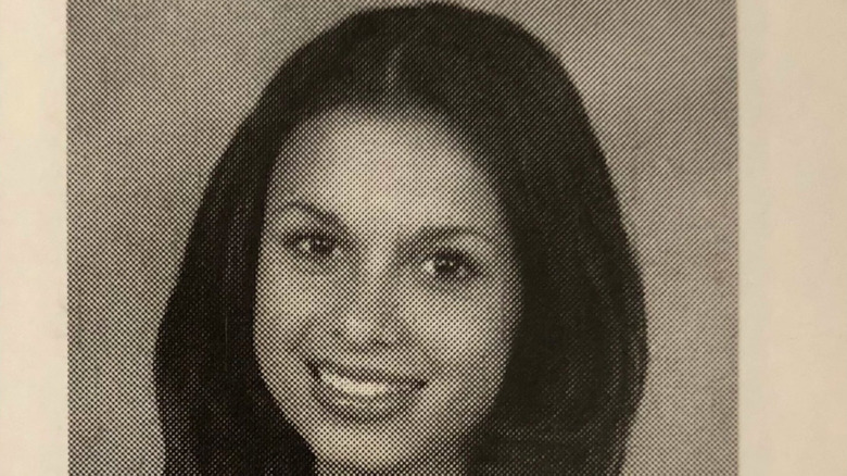 Joy Taylor smiles in her high school black and white yearbook photo.