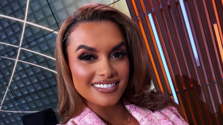 Joy Taylor smiling in a selfie at Fox Sports Studios in 2024