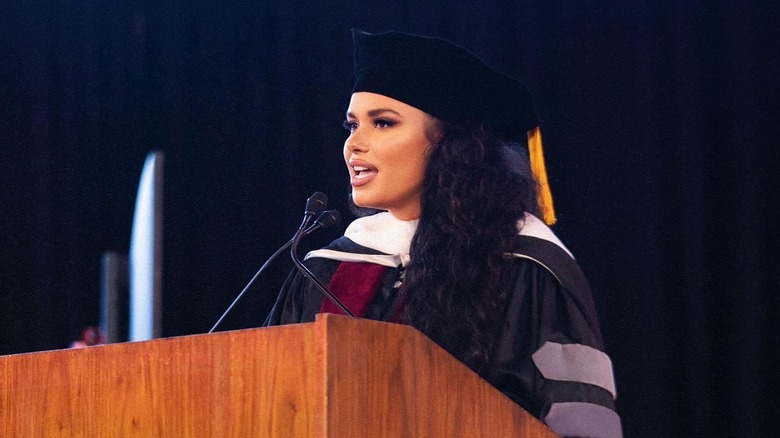Joy Taylor speaking at a Barry University commencement event