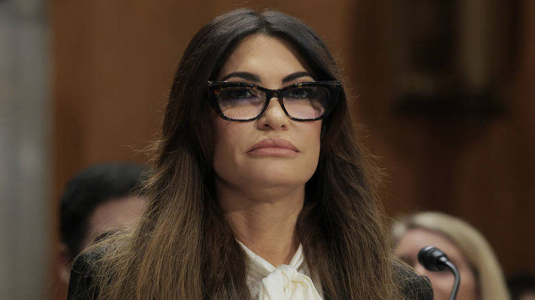 Kimberly Guilfoyle sitting in front of mic during Senate Foreign Relations Committee meeting in 2025