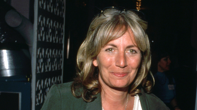 Penny Marshall photographed in front of a dark background
