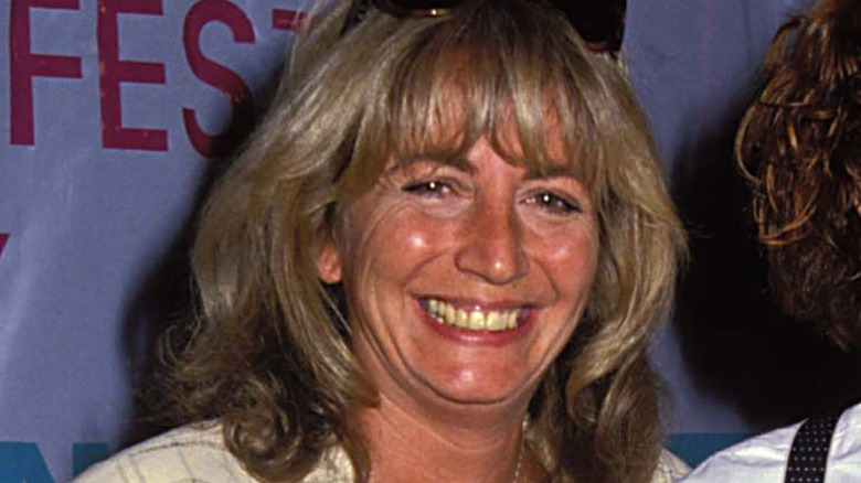 Penny Marshall smiling at an event in 1988