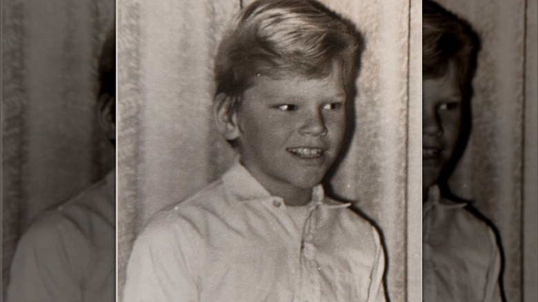 Young Mike Holmes smiling