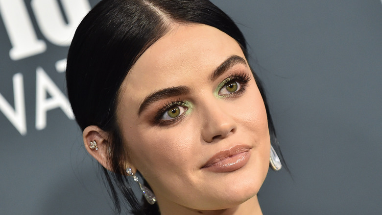 Lucy Hale posing on the red carpet