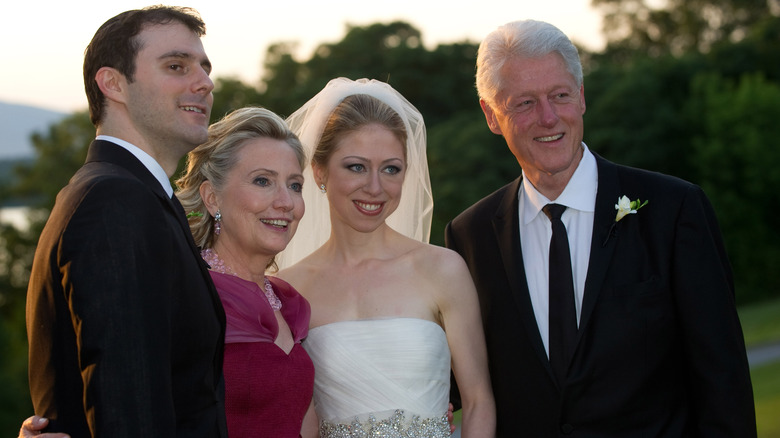 Chelsea Clinton, her parents Bill and Hillary and husband Marc Mezvinsky
